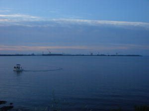 brownfields and powerboat at sunrise