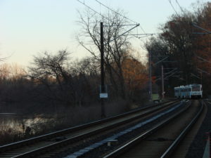 train and lake after sunrise