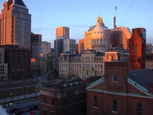 city hall from gay and saratoga at sunrise